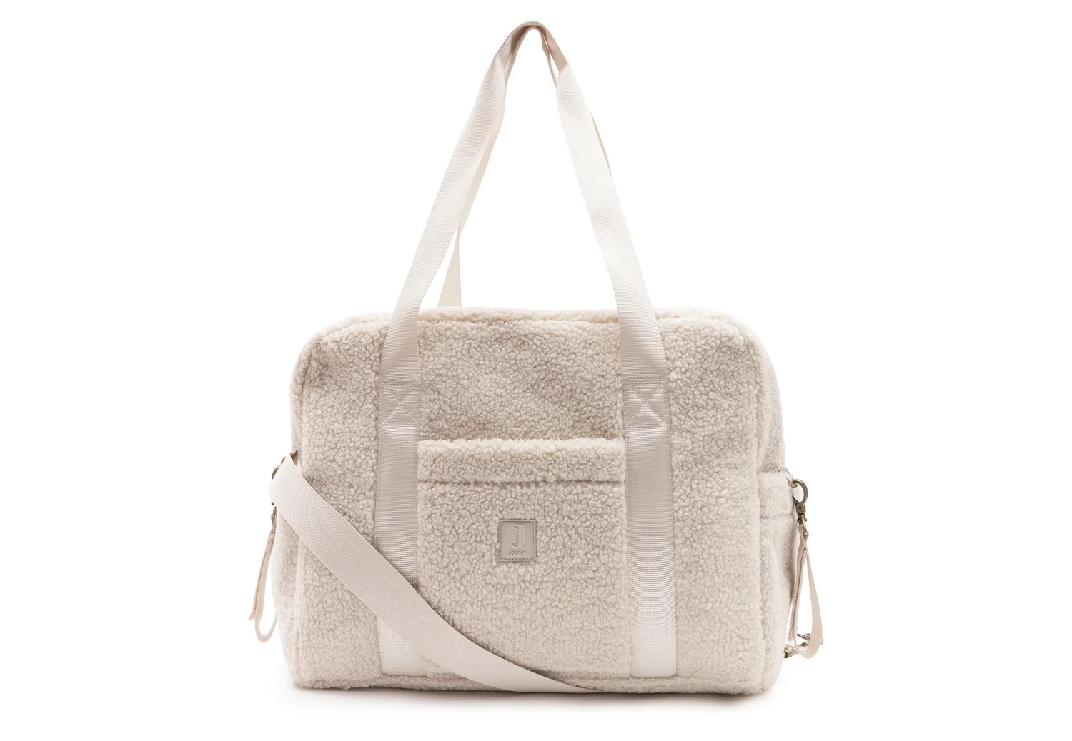 sac à langer famille bouclette couleur crème tout doux vendu avec un tapis à langer nomade de la marque Jollein
